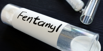 Fentanyl written on a bottle with label.