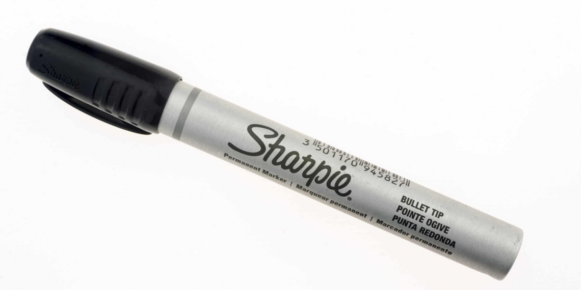 London, England - January 11, 2017: Sharpie Black Permanent Marker Pen, manufactured by Newell Brands since 1857.