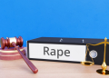 Rape â€“ Folder with labeling, gavel and libra â€“ law, judgement, lawyer