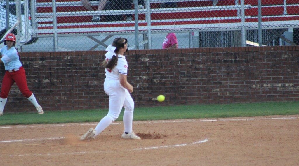 Kaitlyn "lil girl" Davis spins a pitch against Warren County on Thursday