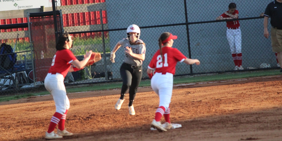 Madison Pruitt heads into 2nd base after hitting double during 2023 action.